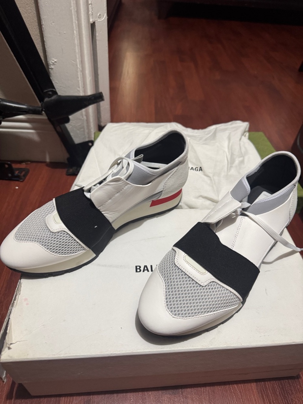 Balenciaga Men’s White Sneakers with Black Strap and Red Heel Accent